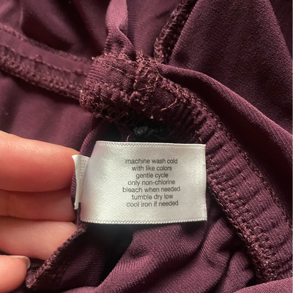 LANE BRYANT Stretchy, Wide Leg, Flutter Sleeve, Faux Wrap Jumpsuit - Picture 12 of 13